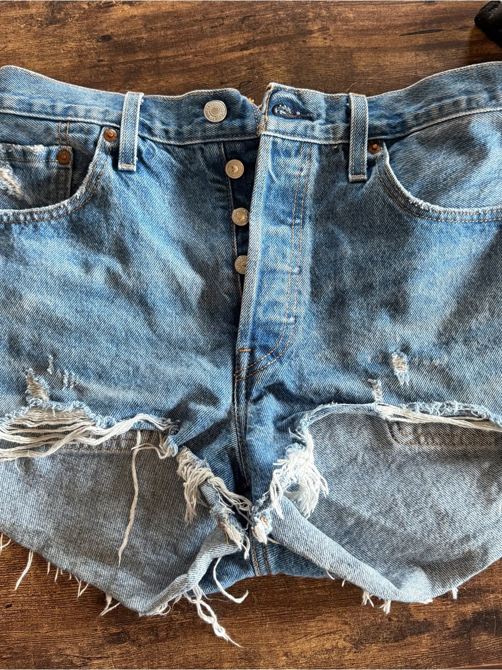 Levi’s High-Rise Distressed Denim Cutoff Shorts - Light Blue